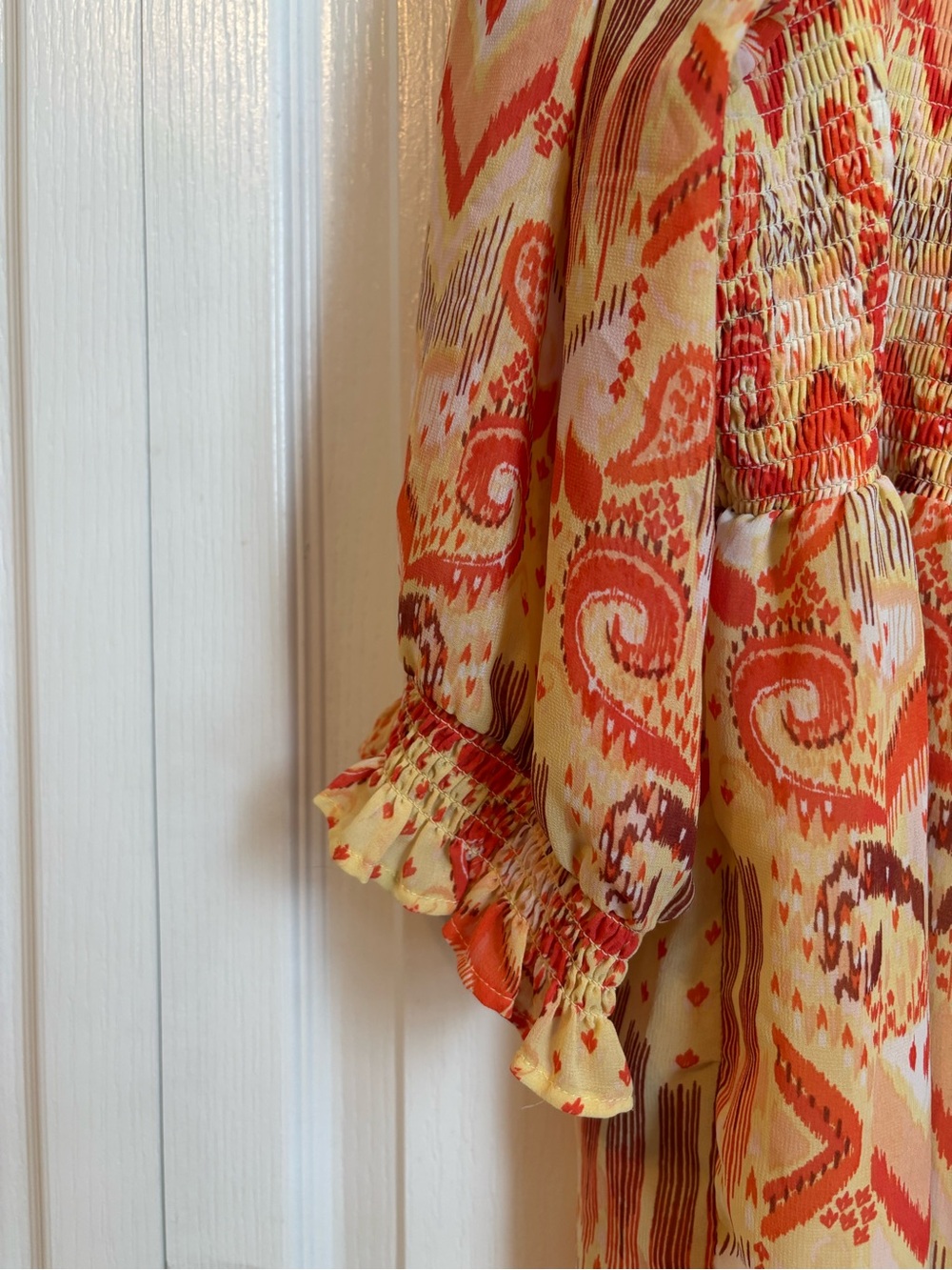 torrid Cream & Orange Paisley Smocked Peasant Tunic - Picture 2 of 7